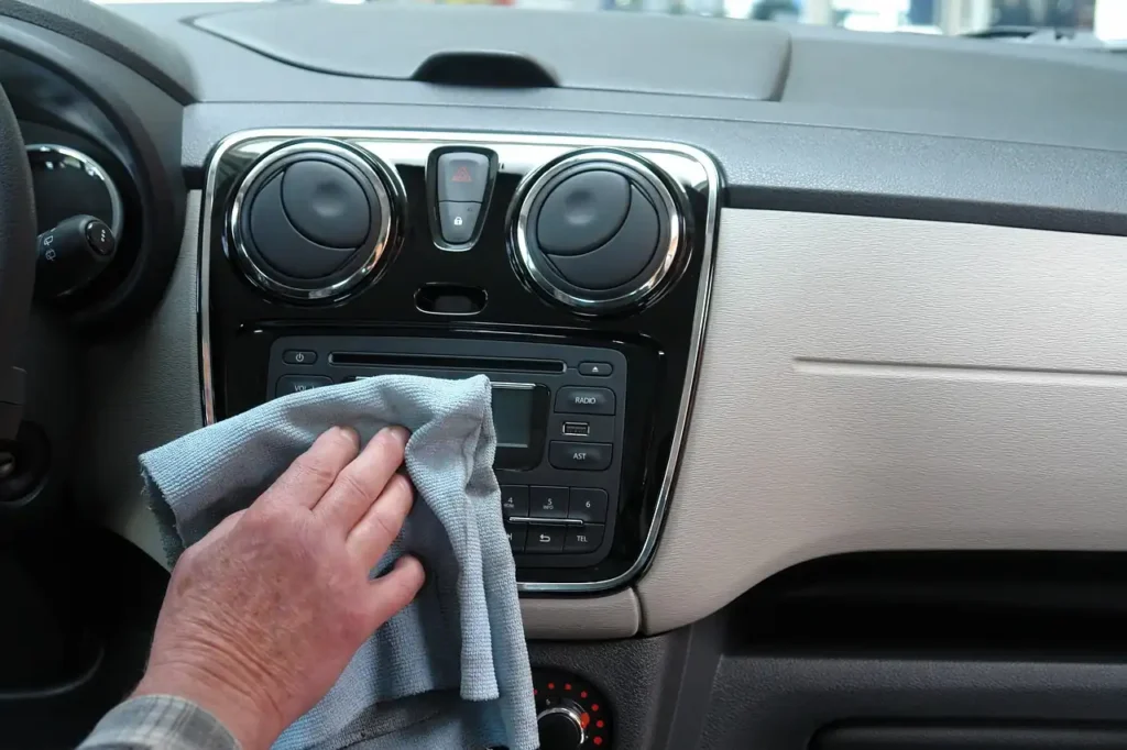 cleaning car with microfibre cloth